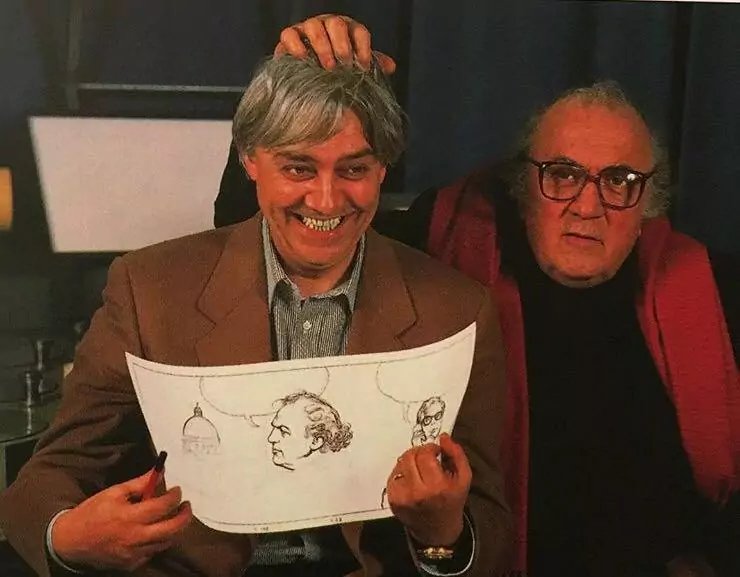 Milo Manara e Federico Fellini insieme con un disegno.